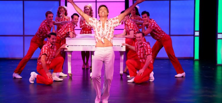 Performers Light Up Stages’ Exuberant ‘The Boy from Oz’